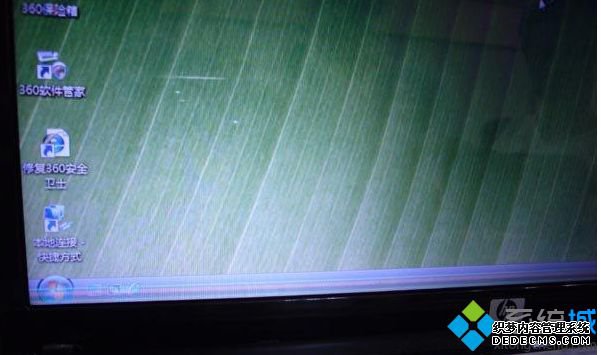 win7系统打开某些程序出现闪屏现象