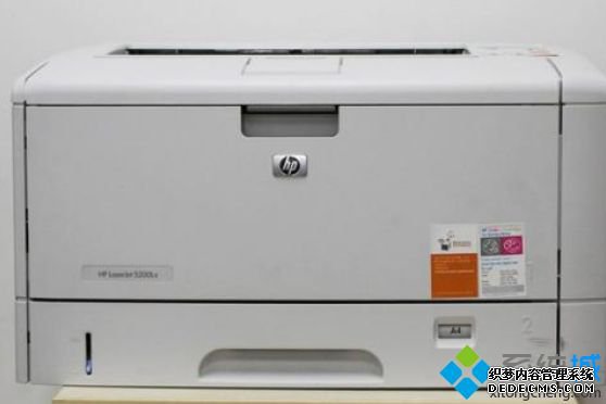 电脑中HP 5200打印机驱动状态显示“暂停打印”的解决方法